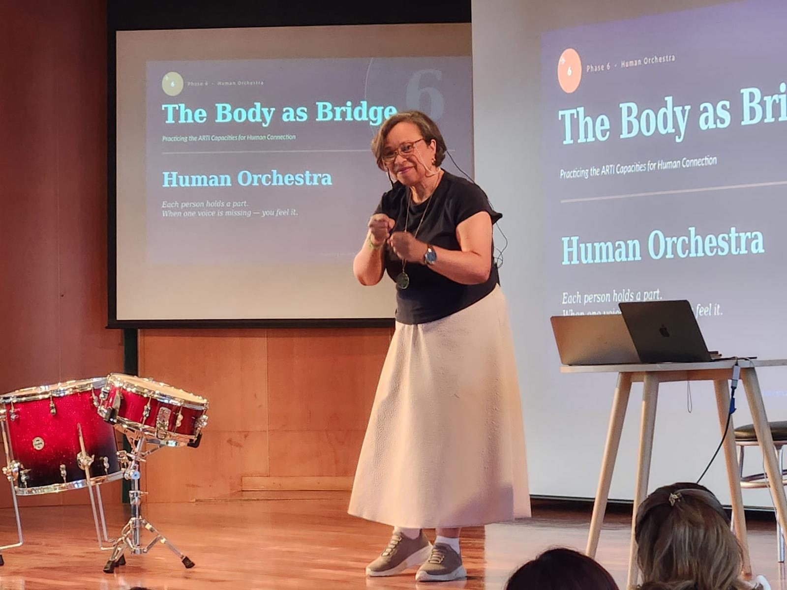 Vilma Esquivel facilitating the Human Orchestra